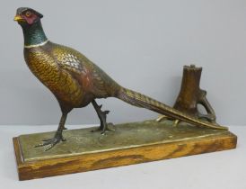 A cold painted table lighter in the form of a pheasant, base 31.5cm