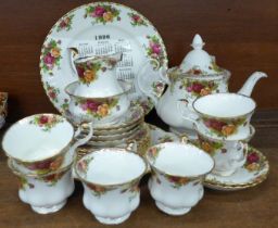 Royal Albert Old Country Roses tea ware; six cups, six saucers, six side plates, sugar, teapot, cake