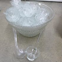 A large glass punch bowl set **PLEASE NOTE THIS LOT IS NOT ELIGIBLE FOR POSTING AND PACKING**