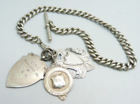 A silver Albert watch chain with three silver fobs, each link marked, 63g, 32cm