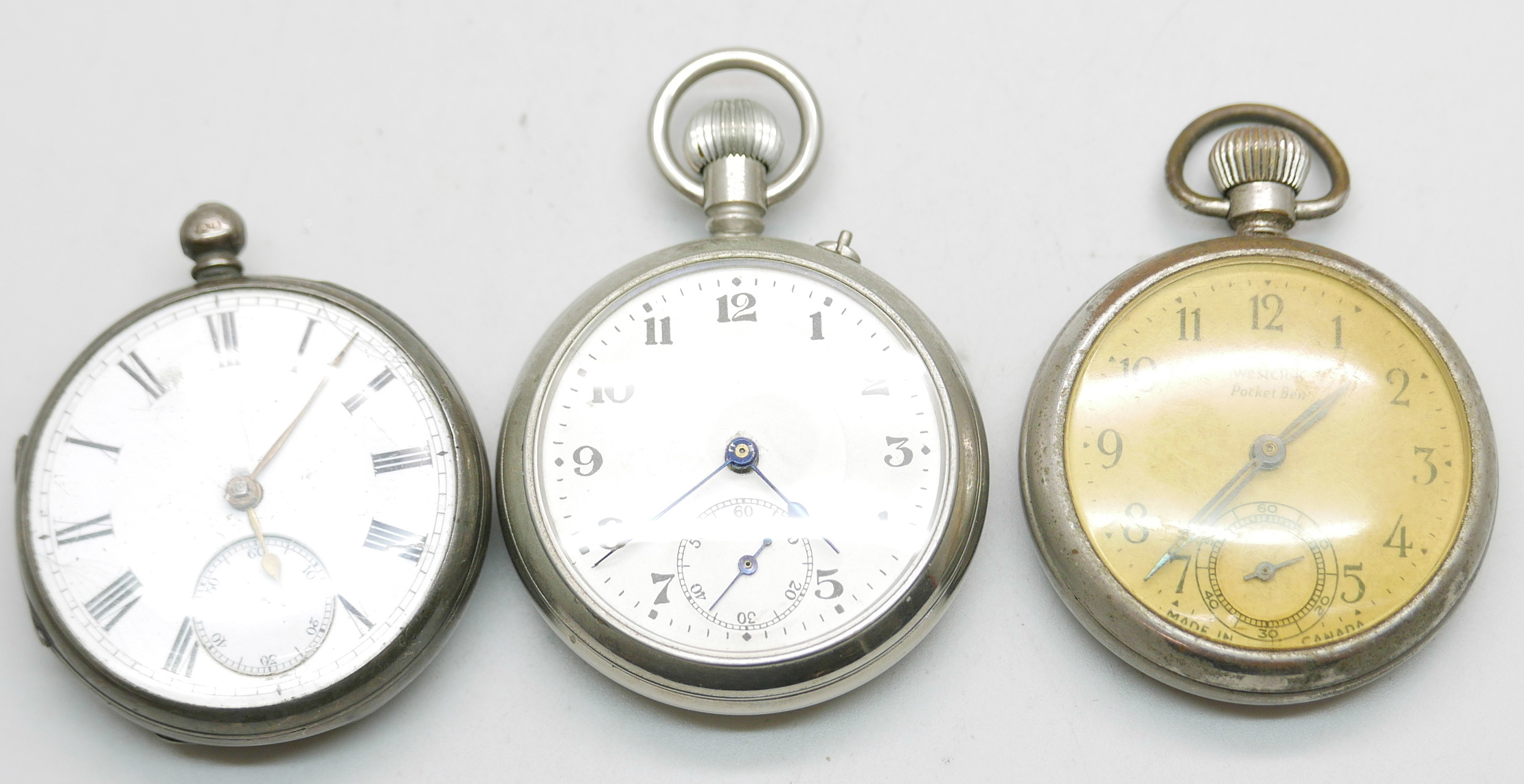 A silver pocket watch, London 1876, lacking loop, and two other pocket watches