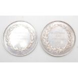 Two National Rifle Association silver medallions, 1860, 106.7g, 46mm
