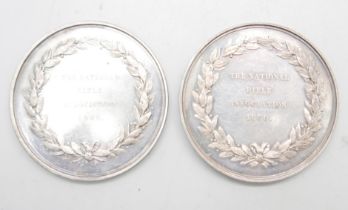 Two National Rifle Association silver medallions, 1860, 106.7g, 46mm