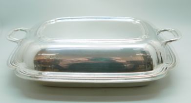 A silver serving dish with two handled lid and beaded border, Sheffield 1933, Robert Stewart, 1261g,