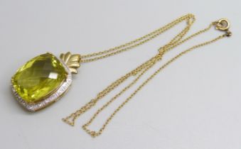 A 9ct gold, scapolite chequerboard cut pendant with diamond accents on a fine 9ct gold chain, 8.8g