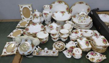 A large quantity of Royal Albert Old Country Roses china including a telephone, clock, trinket