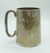 A silver mug, 186g, handle dented