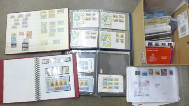 Stamps; a box of Isle of Man stamp albums, covers, booklets, presentation packs, etc.