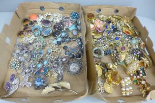 A collection of costume brooches