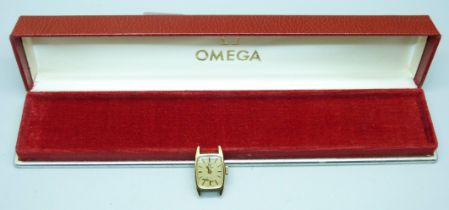 A lady's Omega De Ville wristwatch head with an Omega box