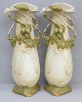 A pair of large Royal Dux Bohemia porcelain vases decorated with olive branches enhanced with