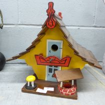 A wooden bird house