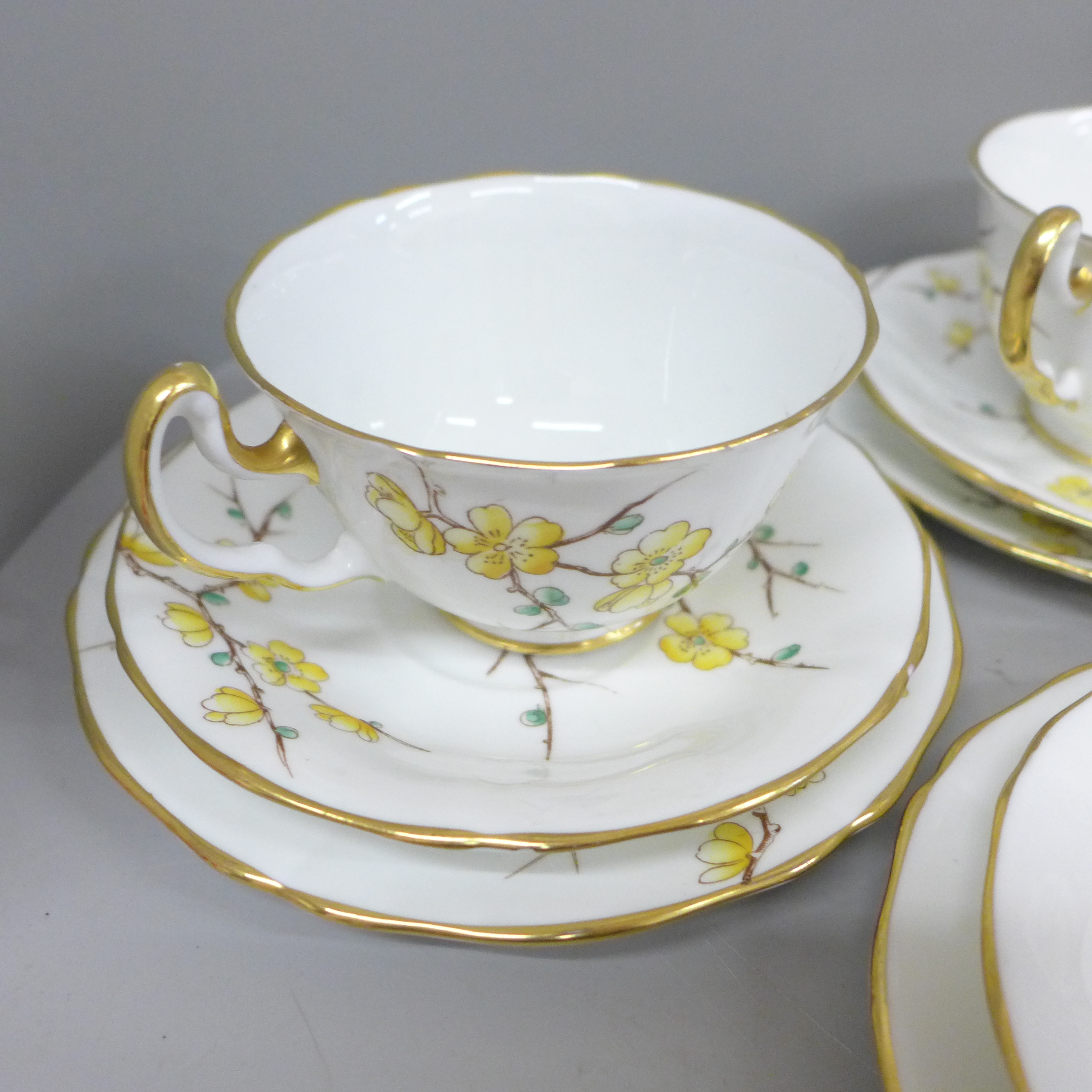 An Adderley fine bone china Chinese Blossom part tea set, five cups, seven saucers and tea plates, - Image 2 of 4