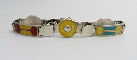 A silver and enamelled bracelet by James Fenton