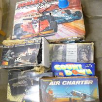 Two Scalextric sets, 500 and 200 and a collection of board games including Air Charter, The Game