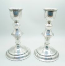 A pair of silver candlesticks, 16.5cm