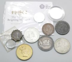 Coins including a USA 1877 quarter dollar, Carson City mint, a Victorian 1889 crown, one other