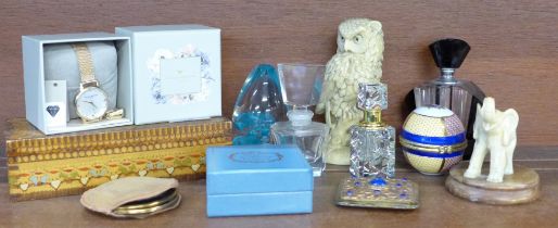 Three perfume bottles, an Olivia Burton wristwatch, compacts, a Bilston Enamels trinket pot, etc.