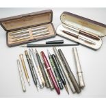 A collection of pens and pencils