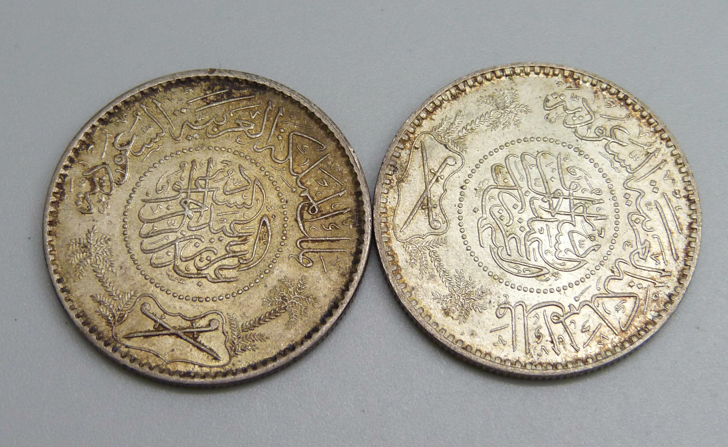 Two Saudi Arabia silver Riyal coins, 23.3g
