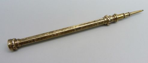 A c1900 yellow metal propelling pencil