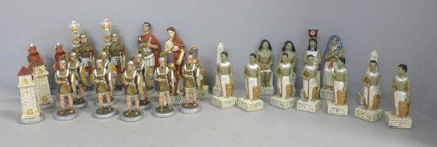 A set of Egyptian and Roman chess pieces, one Egyptian pawn missing