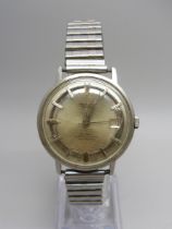 A gentleman's Theseus De Luxe Super Automatic wristwatch, the case back bears inscription dated 1965