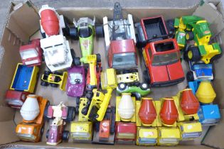 A collection of model vehicles, mainly Tonka, one Marx