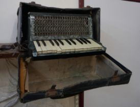 A cased Barcarole accordion, cased