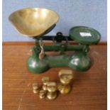 A set of Victor weighing scales with graduated brass weights