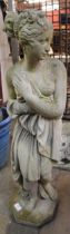 A concrete garden figure of Grecian lady