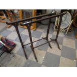 Two wrought iron trestles