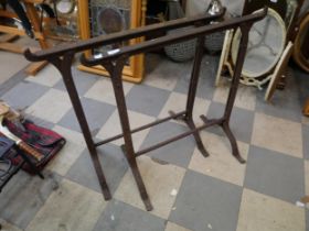 Two wrought iron trestles