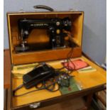 A Singer electric sewing machine in box, circa 1950s