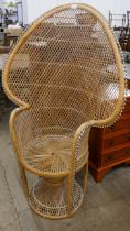 An Italian wicker peacock chair