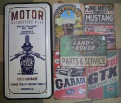 Five motoring related advertising signs