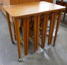 A Poul Hundevad teak nest of tables