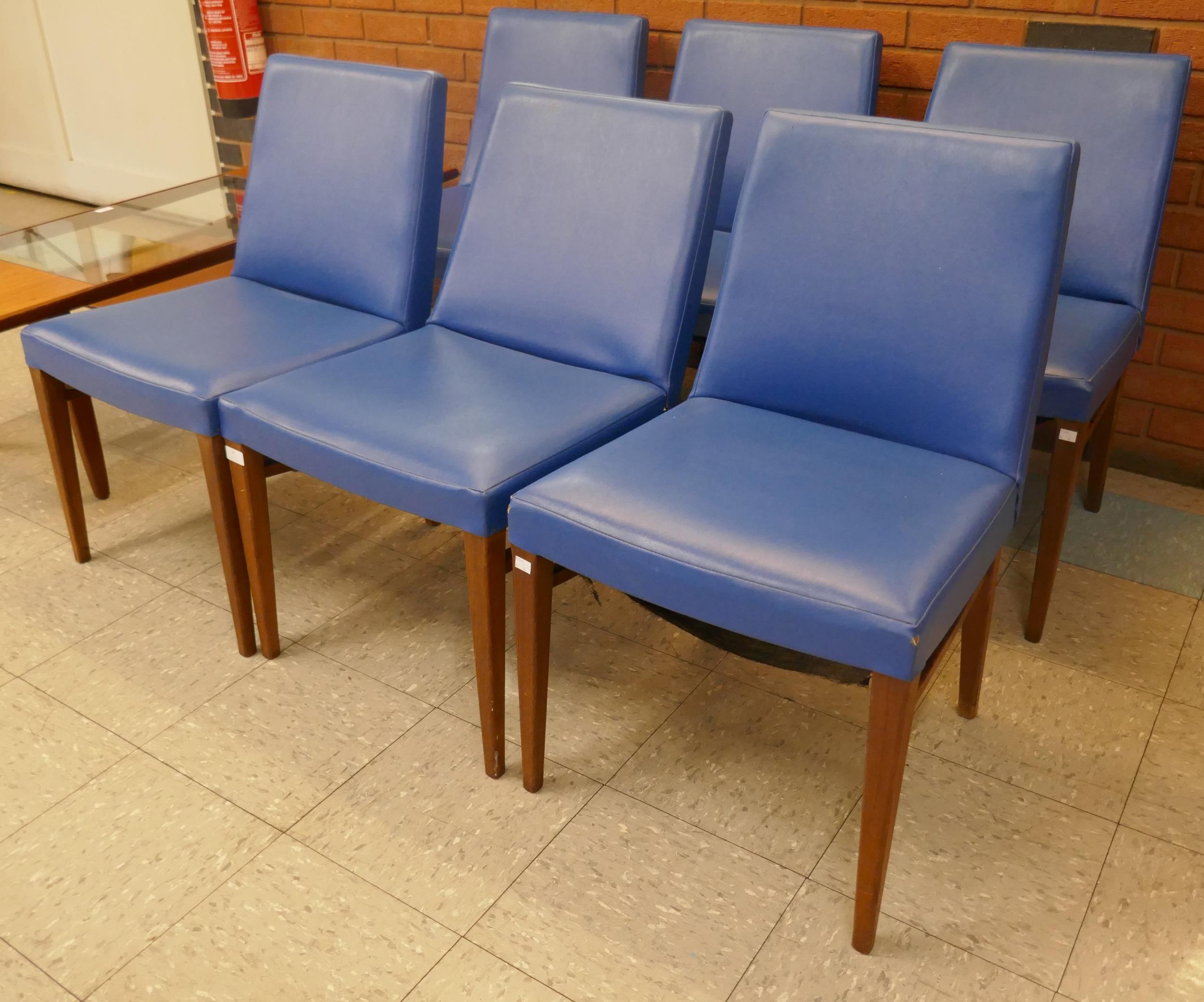 A rare set of six G-Plan Danish Design teak and blue vinyl dining chairs, designed by Ib Kofod