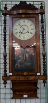 An American marquetry inlaid wall clock