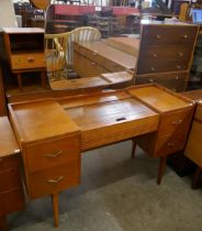 An Austin Suite teak dressing table