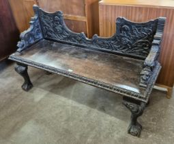 A Victorian Jacobean Revival carved oak window seat