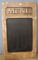 A large menu board sign