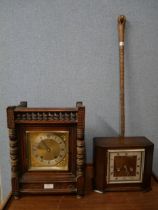 Two clocks and a walking cane