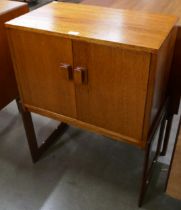 A teak two door side cabinet