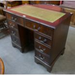 A George III style mahogany kneehole desk