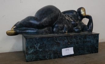 A Surrealist style bronze figure of a reclining female