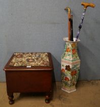 A mahogany commode, an oriental stick stand and three walking sticks
