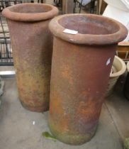 A pair of terracotta chimney-pots