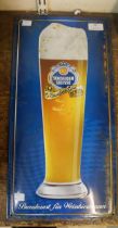 A tin Schneider-Weisse beer advertising sign