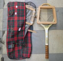A vintage badminton, tennis racquet and tennis balls in carry case